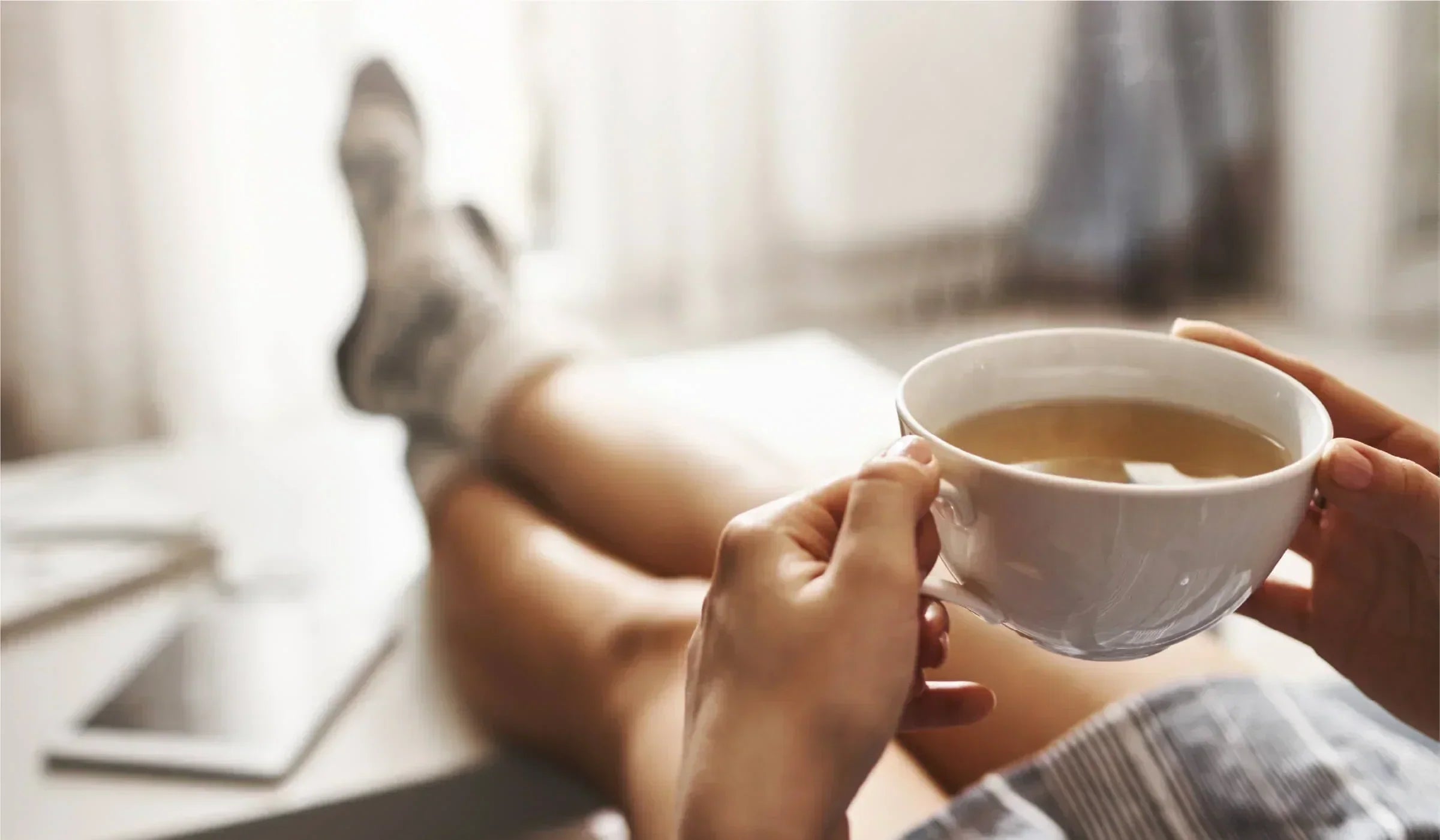 Enjoying a freshly brewed cup of coffee as part of a relaxing morning routine at home