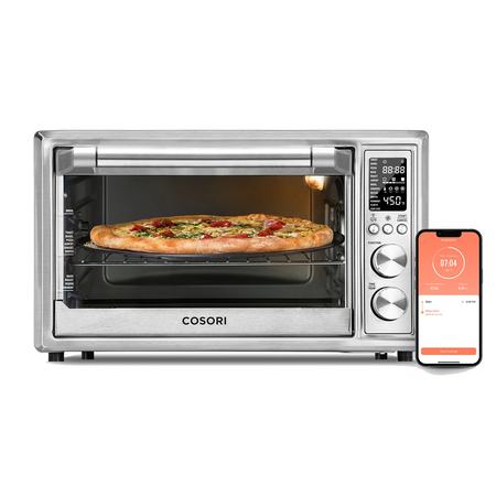 COSORI 30 Liter Smart Air Fryer Toaster Oven with pizza inside and smartphone app displayed beside the unit