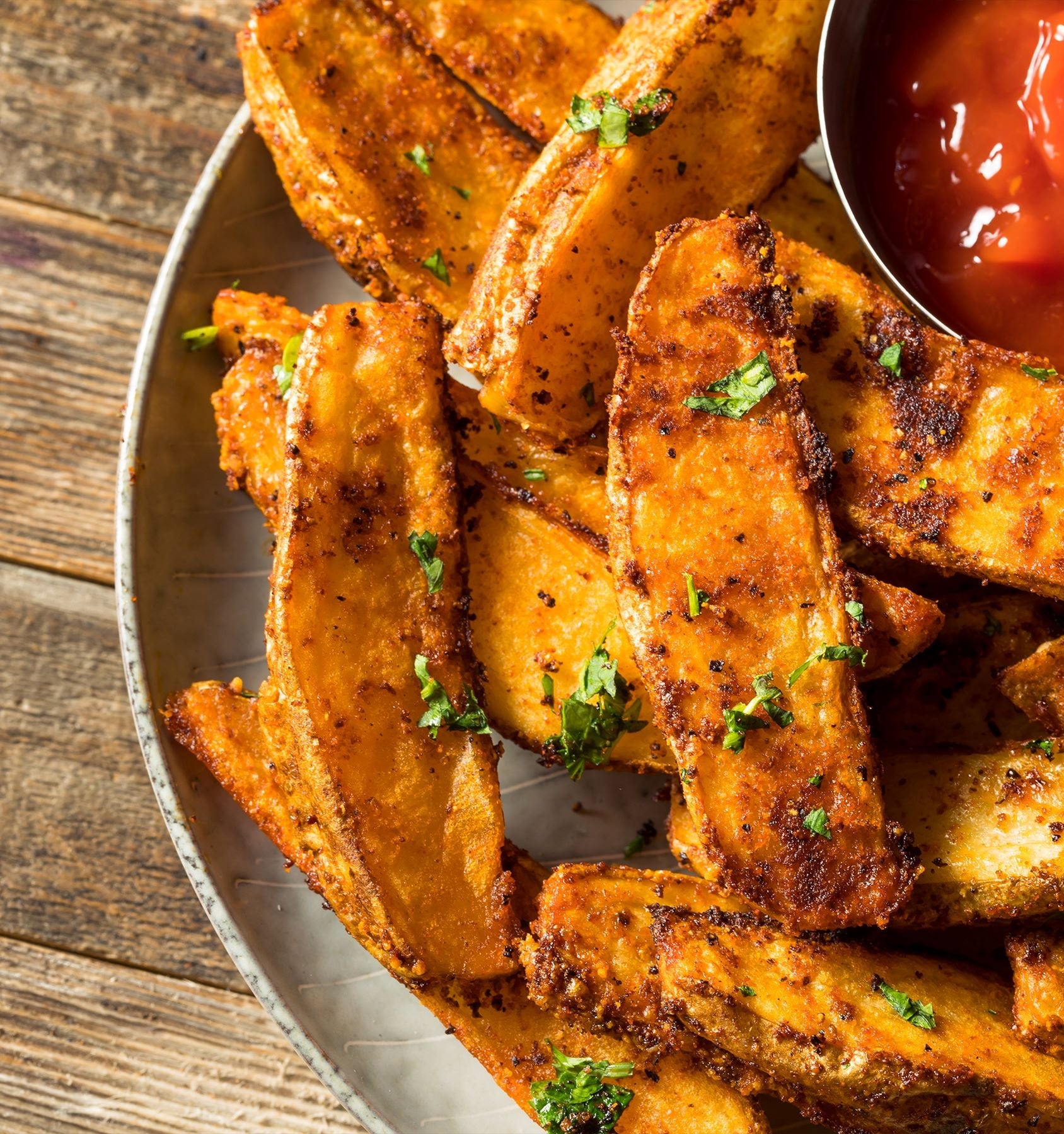 Air Fryer Cajun Boil Spiced Potato Wedges