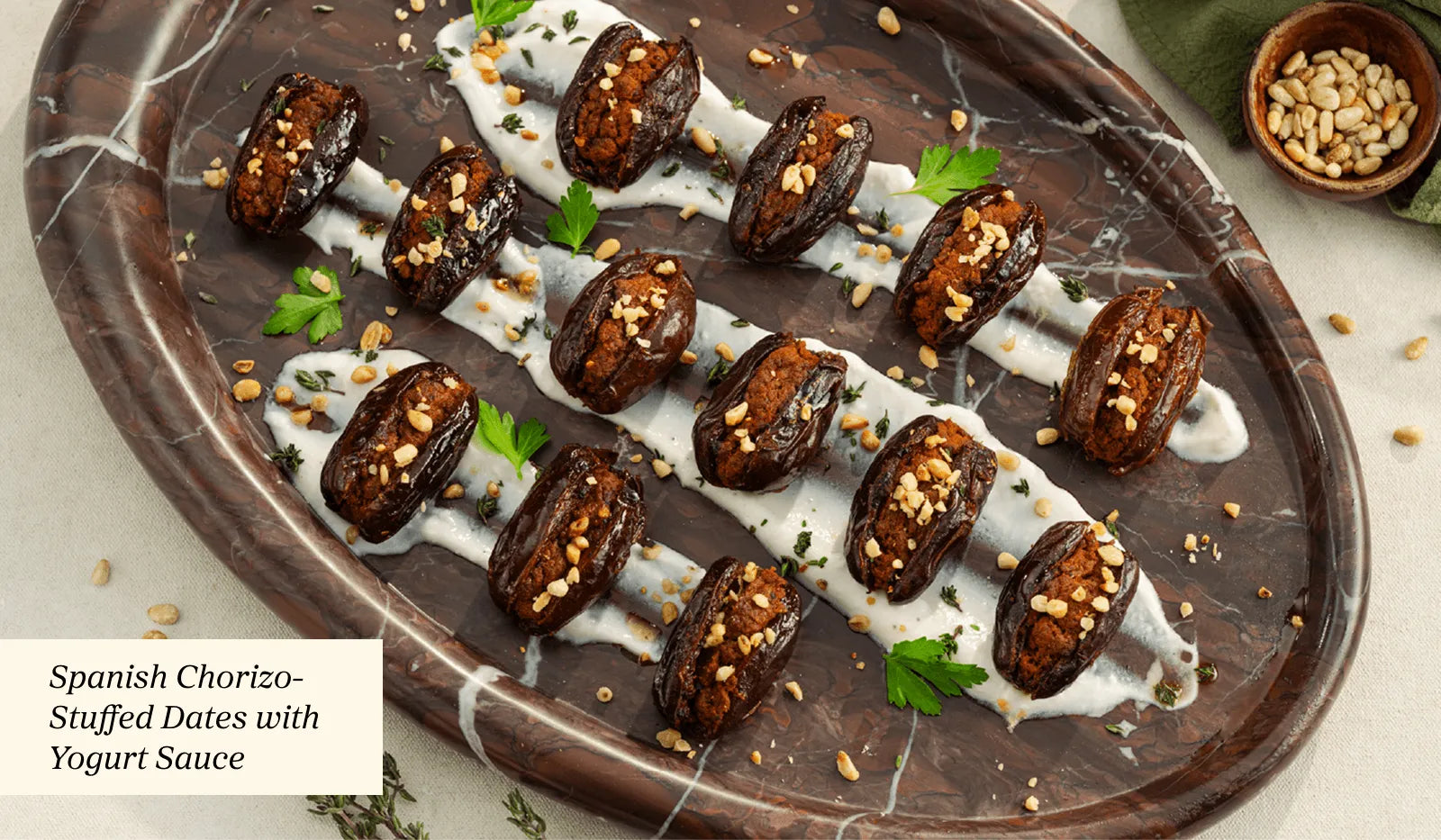 Spanish Chorizo-Stuffed Dates With Yogurt Sauce