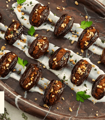 Spanish Chorizo-Stuffed Dates With Yogurt Sauce