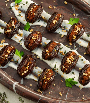 Spanish Chorizo-Stuffed Dates With Yogurt Sauce