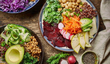 Colorful balanced meal bowl with vegetables, grains, and healthy fats representing everyday nutrition