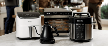 Cosori holiday gift guide collection featuring a white air fryer, pressure cooker, kettle, and dehydrator