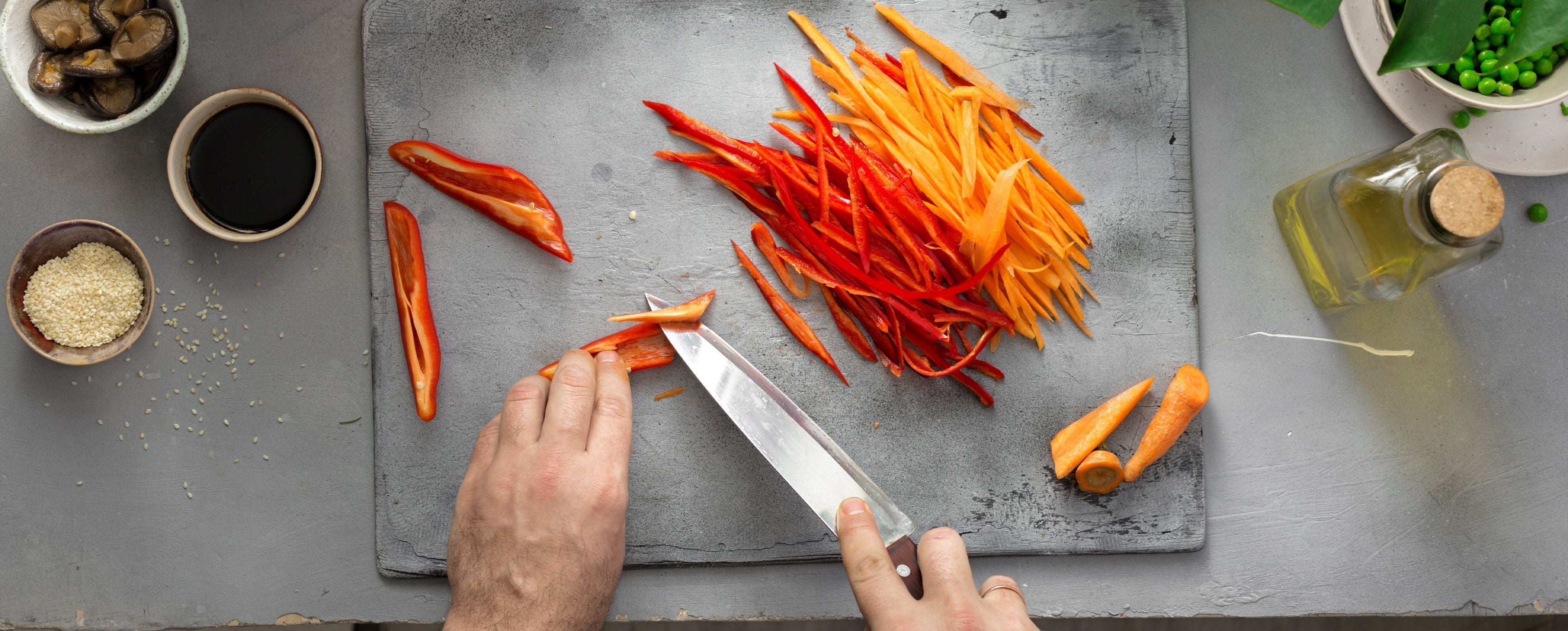 Knife chopping carrots