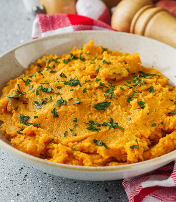 a dish of savory  sweet potato mash