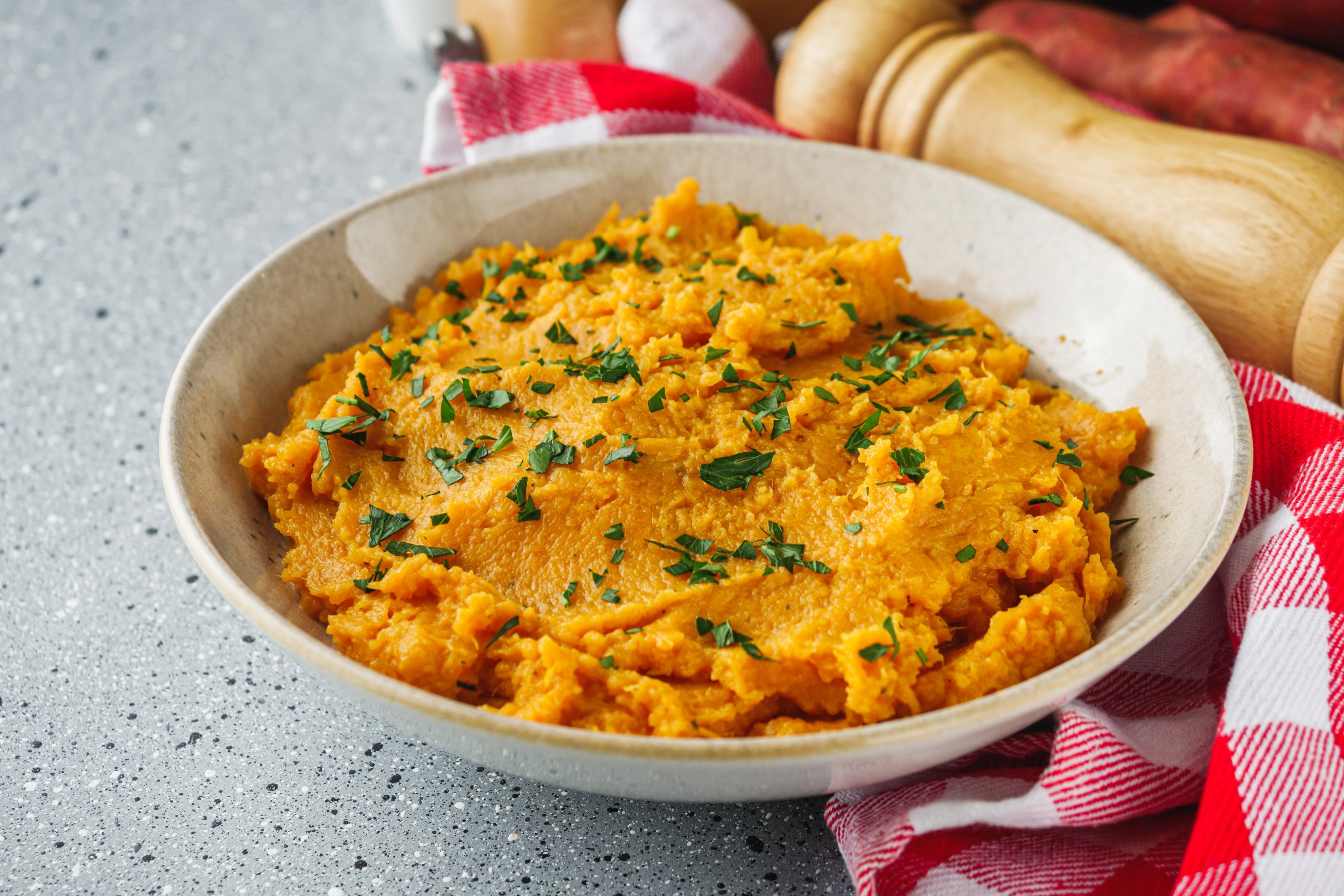 a dish of savory  sweet potato mash