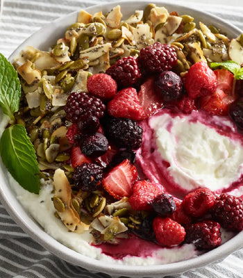 Vanilla Roasted Berry Breakfast Bowl with Pumpkin Seed Clusters 