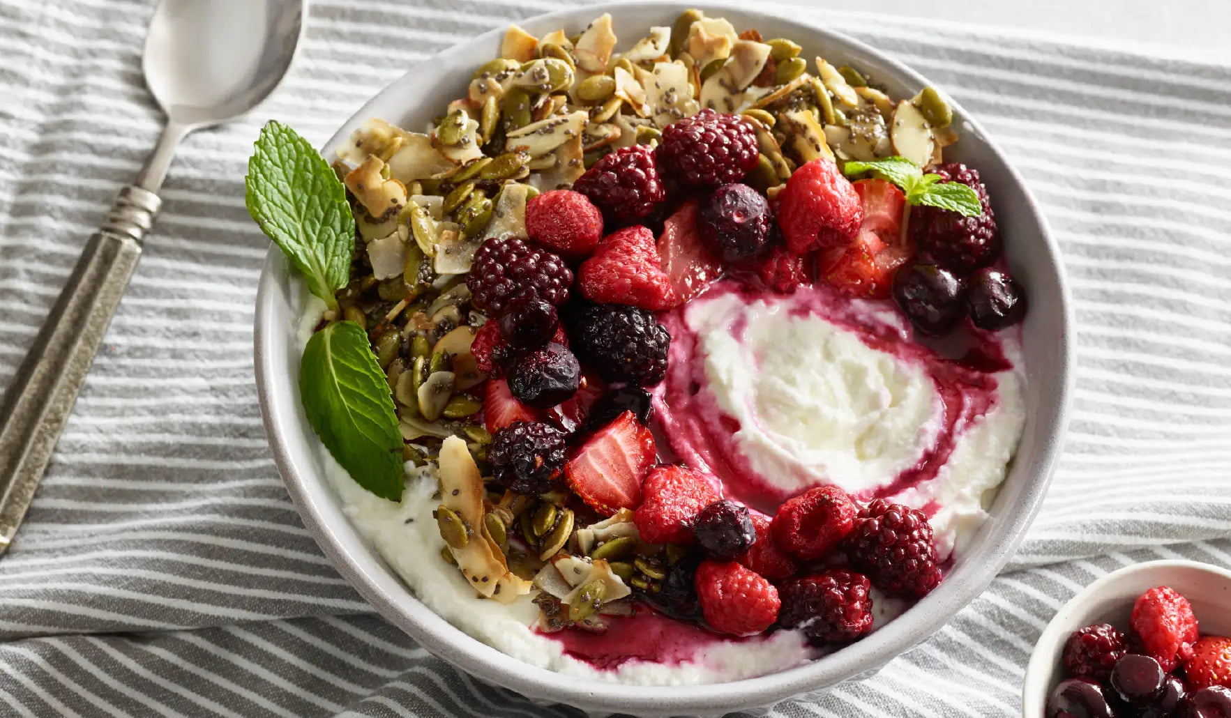 Vanilla Roasted Berry Breakfast Bowl with Pumpkin Seed Clusters 
