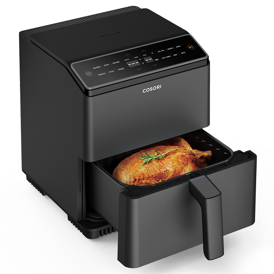 COSORI Dual Blaze 6.8-Quart Smart Air Fryer with basket pulled out showing roasted chicken