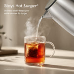 COSORI electric kettle pouring hot tea with heat retention design