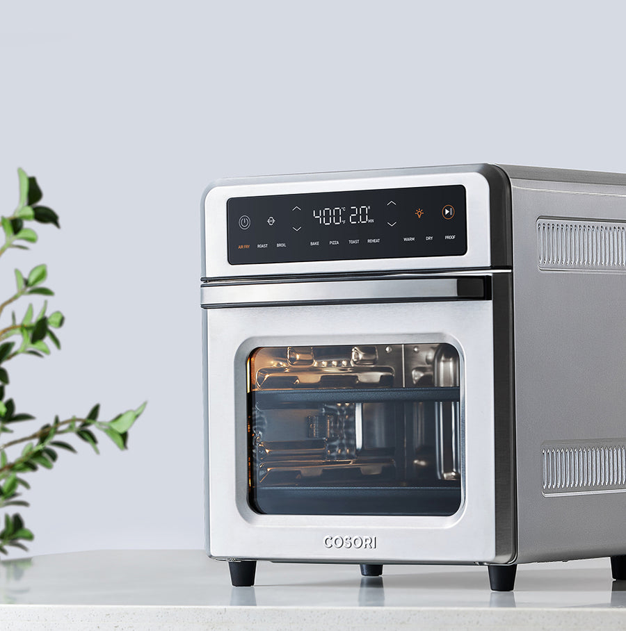 COSORI 13-Quart Air Fryer Oven with tray installed inside cooking chamber
