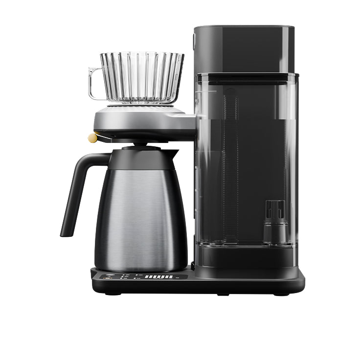 Juni automatic pour-over coffee maker with brew basket and glass carafe, front angle