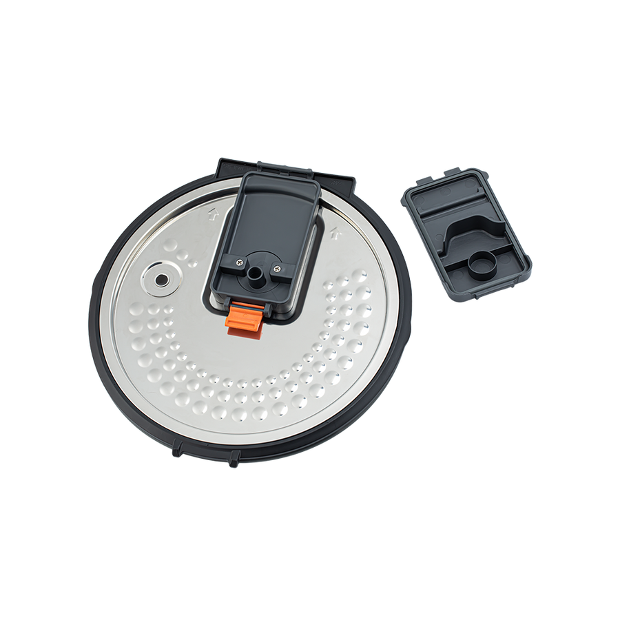Disassembled steam vent cap components from the Cosori Rice Cooker inner lid for easy cleaning.