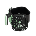 Sage green air fryer basket tilted to show the removable crisper plate inside