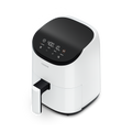 Angled view of the white Cosori Lite 2.1-Quart Mini Air Fryer, ideal for bright kitchen aesthetics.