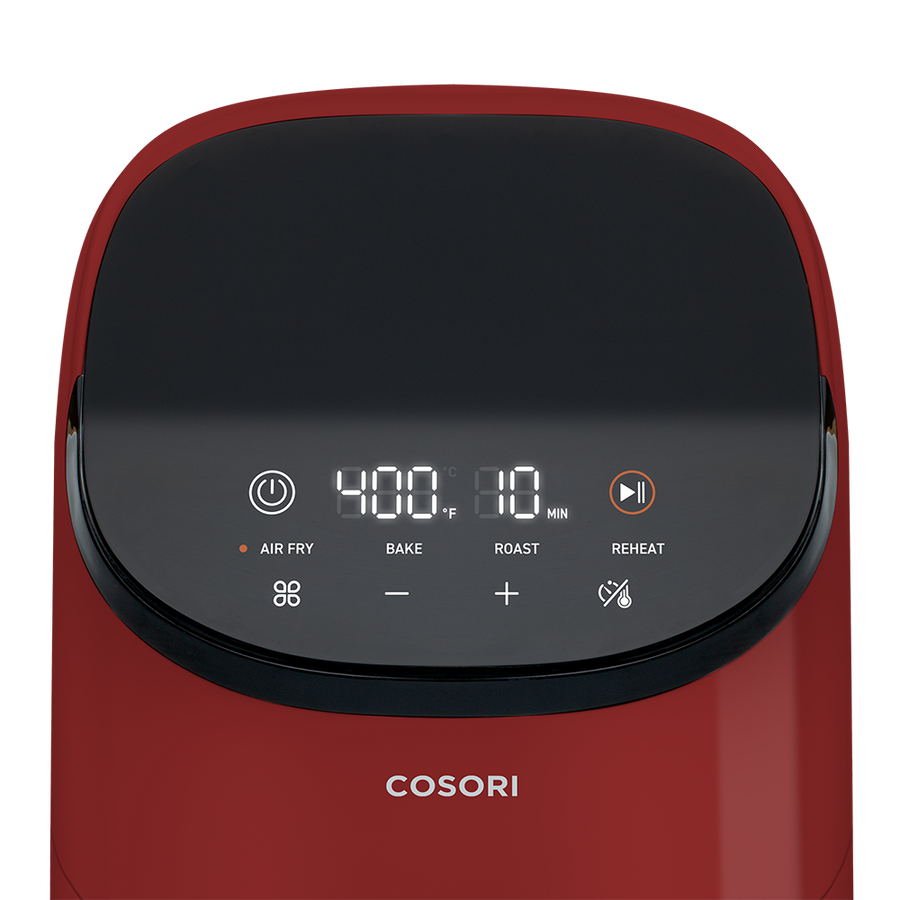 Top-down view of the LED display and cooking presets on the red Cosori Lite Mini Air Fryer