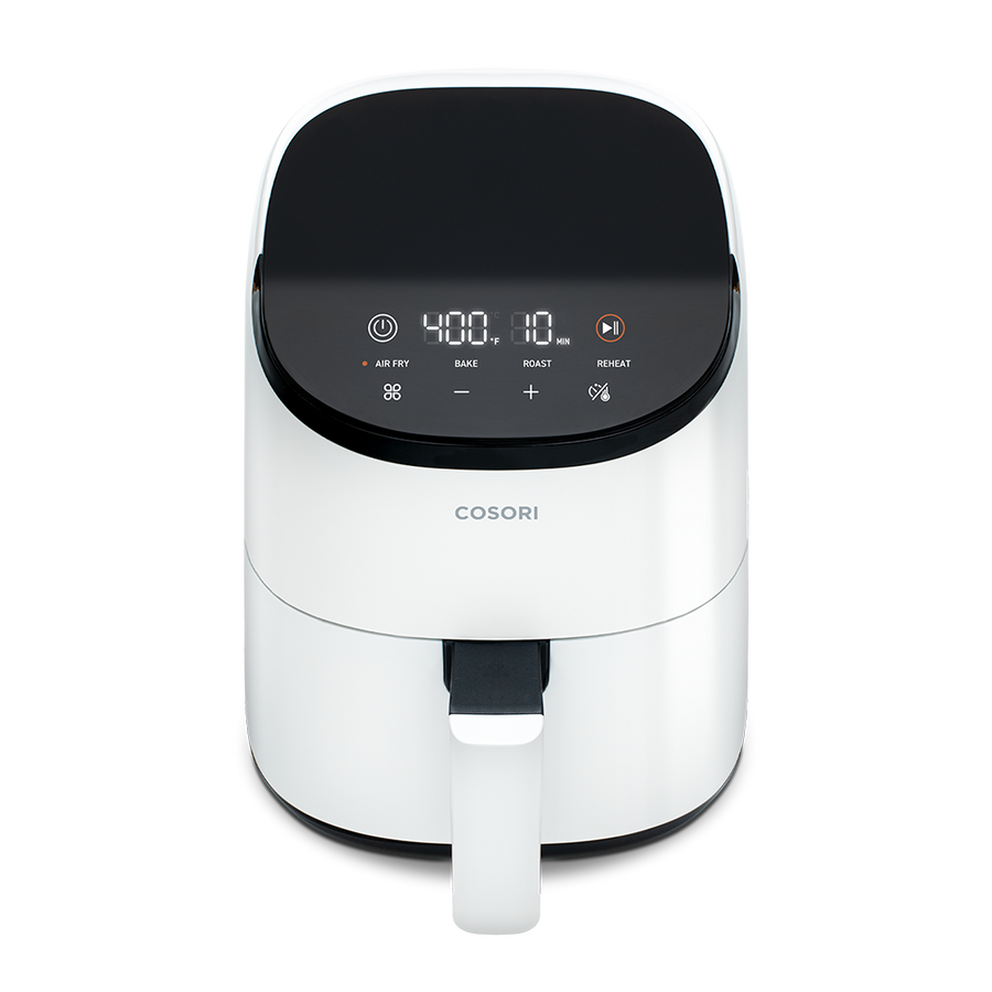 High-angle front view of the white Cosori Mini Air Fryer showing the sleek, modern housing