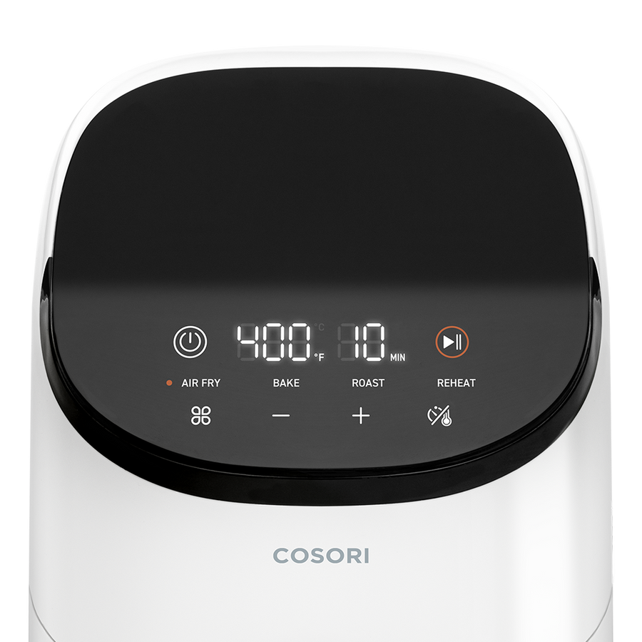 Close-up of the user-friendly digital interface on the white Cosori Lite 2.1-Qt Air Fryer.