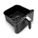 Interior basket view of COSORI Dual Blaze 6.8-Quart Smart Air Fryer with crisper plate installed