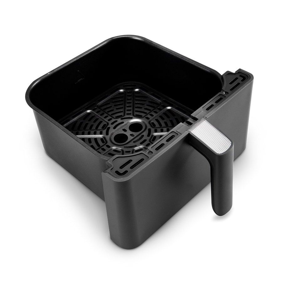 Interior basket view of COSORI Dual Blaze 6.8-Quart Smart Air Fryer with crisper plate installed