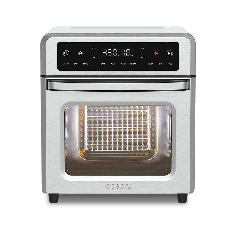 Front straight-on view of the Cosori 13-Quart Air Fryer Oven with the glass door closed and interior empty.