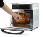 Using the fetch tool to safely remove the rotisserie spit with chicken from the Cosori Air Fryer Oven